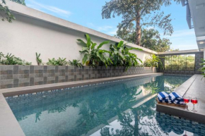 StayVista at Villa Tesoro with Outdoor Pool, WiFi